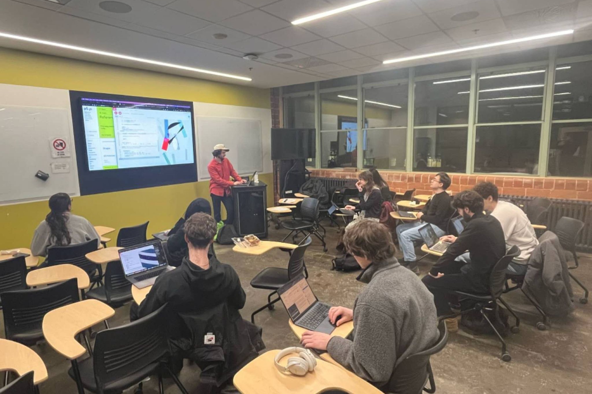 Attendees code along during the workshop at the McGill Engine Centre