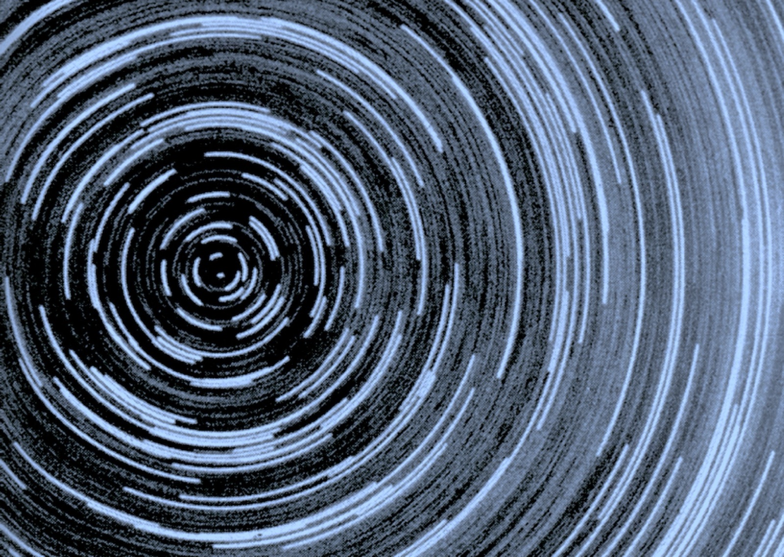 Star trails circling the celestial pole in blue and black — key visual from the event poster